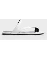 KHAITE - Aimee Leather Flat Toe-Ring Sandals - Lyst