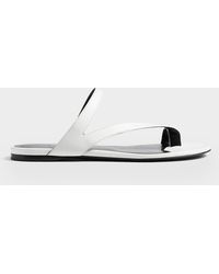 KHAITE - Aimee Leather Flat Toe-Ring Sandals - Lyst