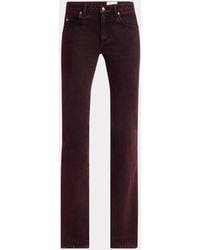 McQueen - Low-Rise-Wash Denim Flare Trousers - Lyst