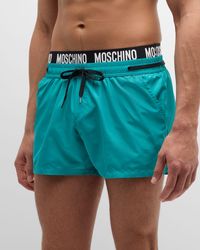 Moschino - Contrast Logo Waistband Swim Shorts - Lyst