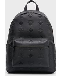 MCM - Stark Mini Embossed Leather Backpack - Lyst