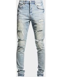 Purple - Distressed Light-wash Paint Jeans - Lyst