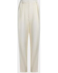 Altuzarra - Emmett Pleated Tapered-Leg Wool Pants - Lyst