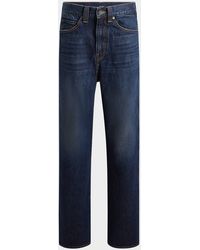 KHAITE Vivian Dark Blue Bootcut Jeans | Lyst