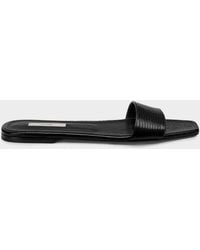 TOTEME - Lizard-Embossed Leather Flat Sandals - Lyst