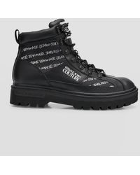 Versace - Syrius Allover Logo Combat Boots - Lyst