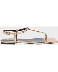 Versace - Medusa Metallic T-Strap Flat Sandals - Lyst