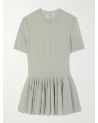 Alaïa - Wool Peplum Top - Lyst