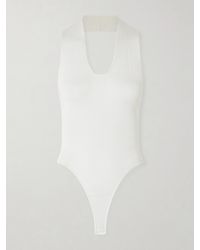 KHAITE - Toto Stretch-Knit Halterneck Bodysuit - Lyst