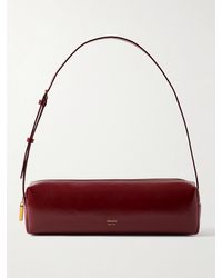 KHAITE - Kye Glossed-Leather Shoulder Bag - Lyst