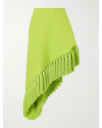 Alaïa - Tassle Fringed Asymmetric Wool-Gabardine Midi Skirt - Lyst