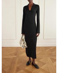 altuzarra lafont ruffled silk maxi dress The Lafont dress is crafted in Italy from silk satin into a maxi silhouette, featuring a ruffled trim and short puffed sleeves. www.altuzarra.com #AltuzarraFW24