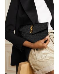 uptown calfskin leather envelope clutch