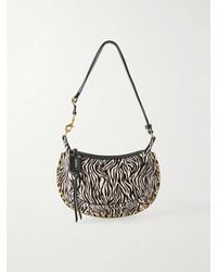 Isabel Marant - Oskan Moon Zebra-Print Leather-Trimmed Calf-Hair Shoulder Bag - Lyst