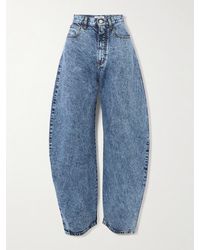 Alaïa - High-Rise Barrel-Leg Jeans - Lyst