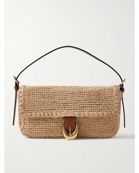 STAUD - Harlow Schultertasche Aus Raffiabast Mit Lederbesätzen Und Schnalle - Lyst