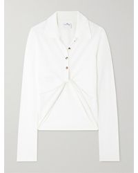 Courreges - Oberteil Aus Baumwoll-Piqué Mit Polokragen Und Twist-Detail - Lyst