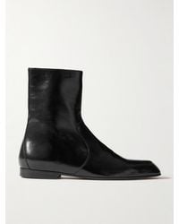 KHAITE - Colt Glossed-Leather Ankle Boots - Lyst