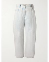 Alaïa - Low-Rise Barrel-Leg Jeans - Lyst