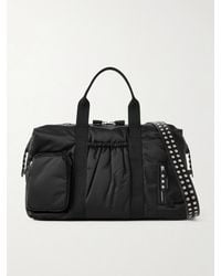Anya Hindmarch - Inflight Maxi Studded Leather-Trimmed Econyl Weekend Bag - Lyst