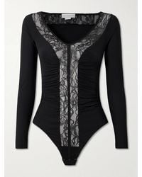 Stella McCartney - Lace-Trimmed Ruched Stretch Recycled-Jersey Bodysuit - Lyst