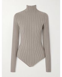 Alaïa - Ribbed Wool Turtleneck Bodysuit - Lyst