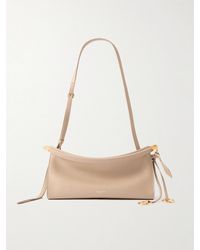Alaïa - Le Click E/W Small Leather Shoulder Bag - Lyst
