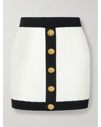 Balmain - Button-Embellished Two-Tone Ribbed-Knit Mini Skirt - Lyst
