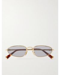 Miu Miu - Goldfarbene Sonnenbrille Mit Ovalem Rahmen - Lyst