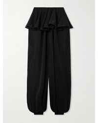 Alaïa - Pleated Georgette Peplum Tapered Pants - Lyst