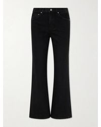KHAITE - Clara Flared Jeans - Lyst