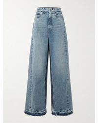 Stella McCartney - Zweifarbige Halbhohe Jeans Mit Weitem Bein Und Fransen - Lyst