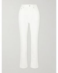 Alaïa - High-Rise Slim-Leg Jeans - Lyst