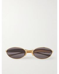 Bottega Veneta - Sardine Goldfarbene Sonnenbrille Mit Ovalem Rahmen - Lyst