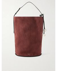 Alaïa - Hip Large Logo-Detailed Leather-Trimmed Suede Bucket Bag - Lyst