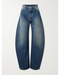 Alaïa - High-Rise Barrel-Leg Jeans - Lyst