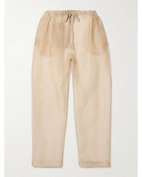 KHAITE - Trenton Pleated Silk-Organza Tapered Pants - Lyst