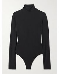 Alaïa - Open-Back Jersey Turtleneck Bodysuit - Lyst