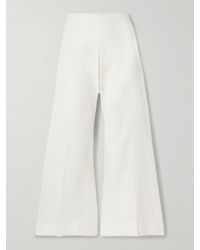 KHAITE - Walter Cotton-Canvas Flared Pants - Lyst