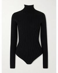 Alaïa - Ribbed Wool Turtleneck Bodysuit - Lyst
