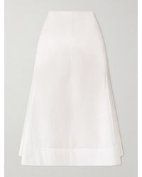 KHAITE - Artin Paneled Cotton-Poplin Midi Skirt - Lyst