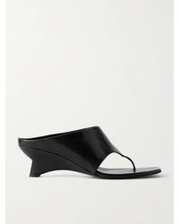 KHAITE - Marlowe Leather Wedge Mules - Lyst