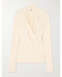 TOTEME - Wrap-Effect Draped Stretch-Jersey Top - Lyst