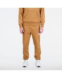 New Balance - Essentials Stacked Logo French Terry Sweatpant In Brown Cotton Fleece - Lyst