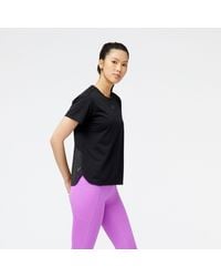 New Balance - Impact Run Luminous Short Sleeve In Black Poly Knit - Lyst