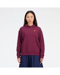 New Balance - Sport essentials premium fleece hoodie in rot - Lyst