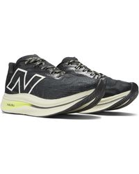 New Balance - Fuelcell Supercomp Trainer V2 In Black/green Synthetic - Lyst