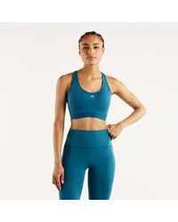 New Balance - Nb Essential Run Bra - Lyst