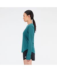 New Balance - Accelerate long sleeve top in grün - Lyst