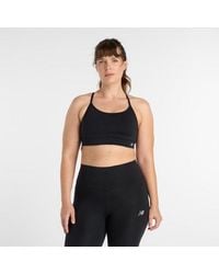 New Balance - Nb Essential Yoga Bra - Lyst